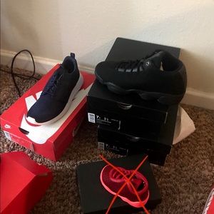 2 pairs of blk Jordan’s size 7Nike slides size 8
